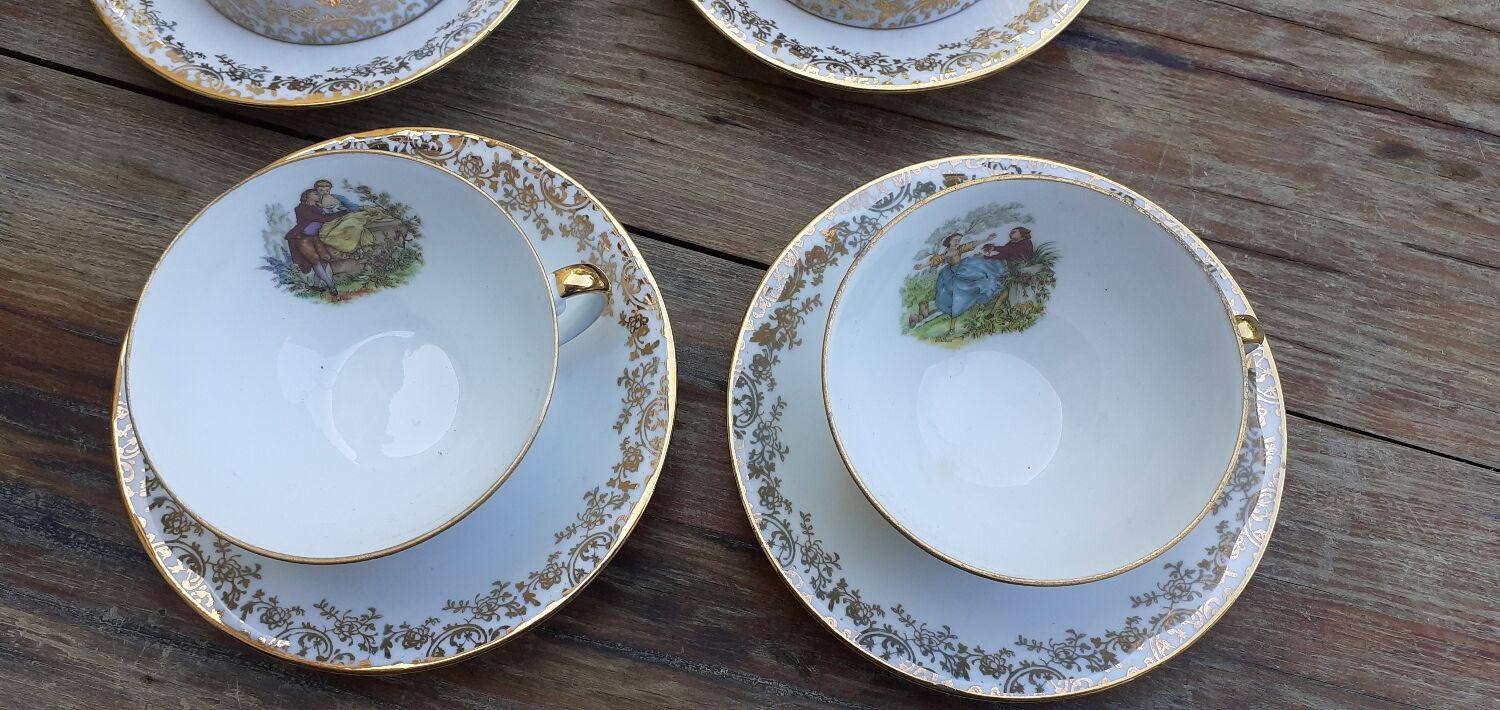 Set of 4 cups and sugar bowl Haute porcelaine de Berry