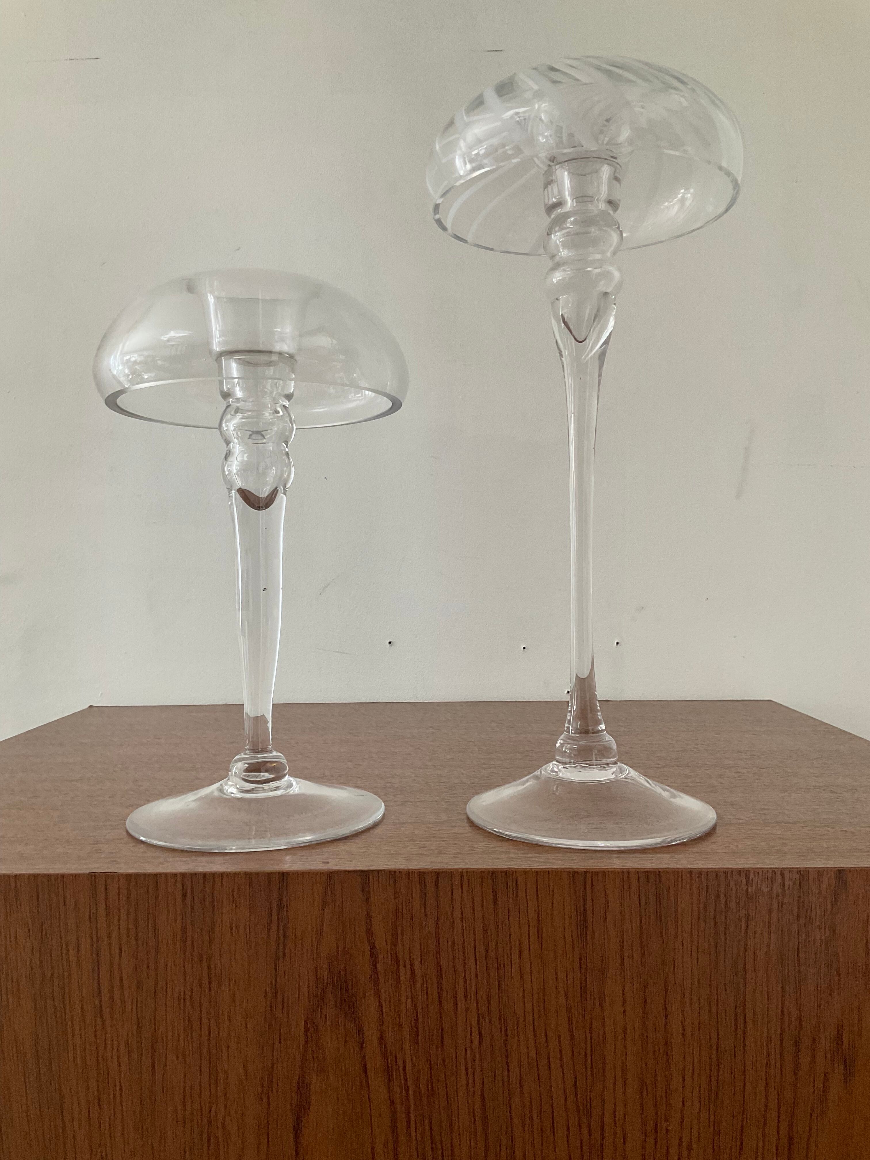 Pair of candle holders in glass paste
