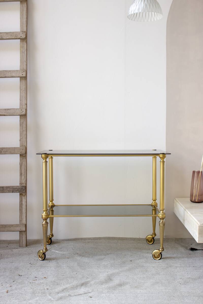 Gold metal and smoked glass server