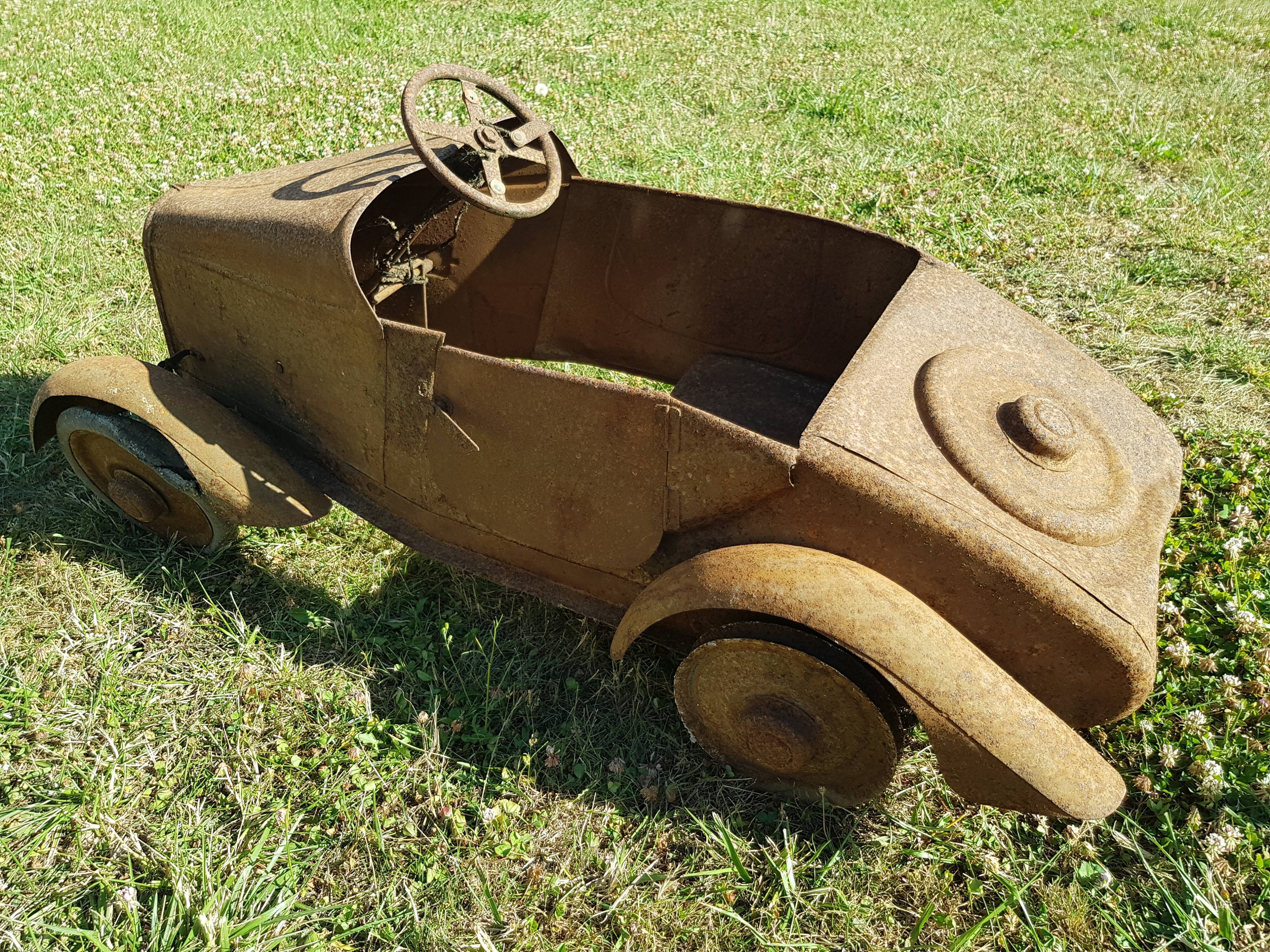 Old pedal car