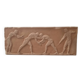 Bas-relief in the antique style featuring athletes.