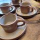 Service of 5 cups and saucers in brown stoneware – 1970s–1980s