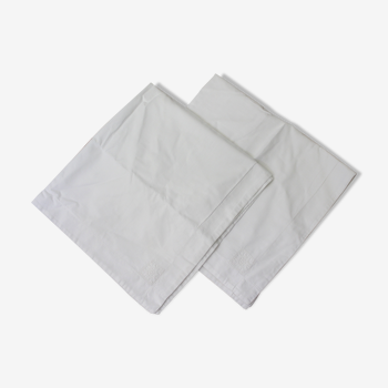 Pair of white cotton pillowcases