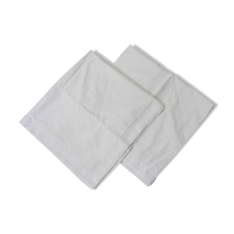 Pair of white cotton pillowcases