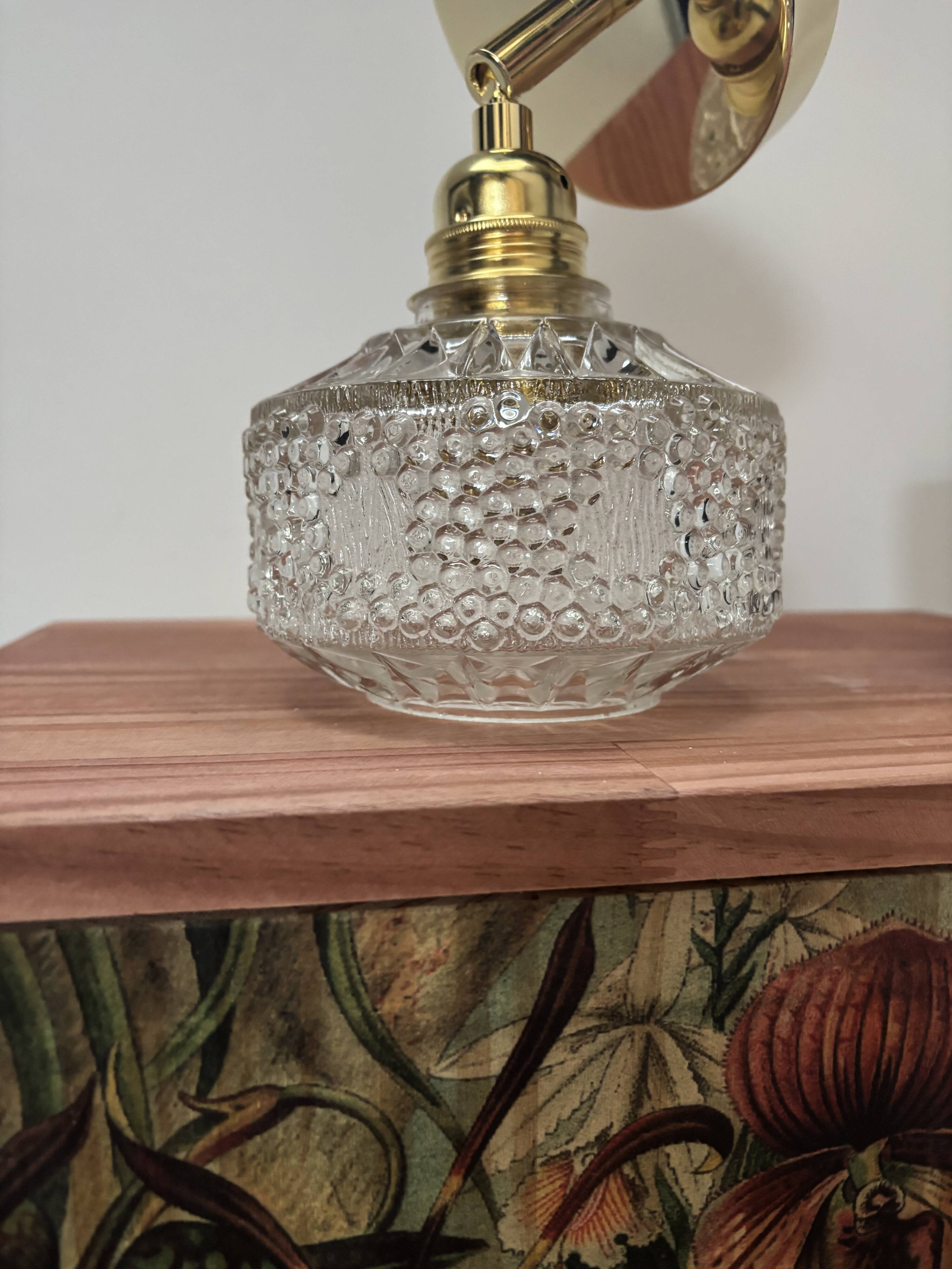 Gold tilting wall light