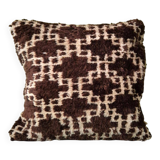 Cushion cover in an ancient Berber rug.