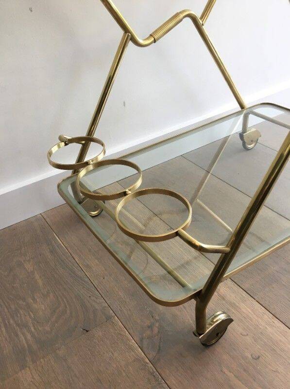 Italian designer rolling table in brass and engraved glass