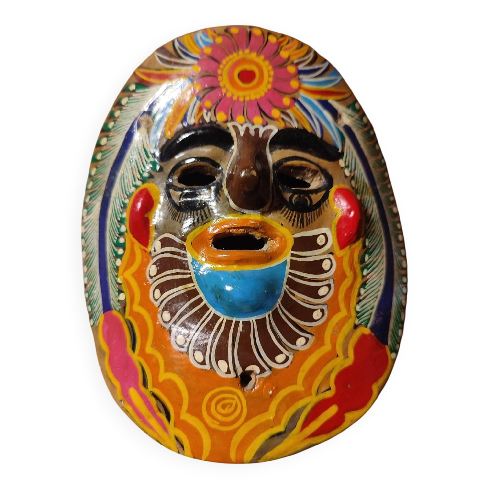 Mexican mask from the 1970s, hand-painted on terracotta.