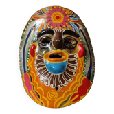 Mexican mask from the 1970s, hand-painted on terracotta.