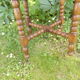 Side table with beaded legs