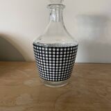 Small black and white checkered carafe with original glass stopper