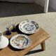 Assiette ancienne en faïence à décor de paysage bleu D24,5