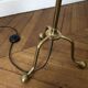 Tripod floor lamp with adjustable height and shelf from the 1960s.