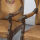 Ensemble de deux fauteuils anciens en cuir
