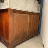 Antique wood and marble kitchen sideboard with carved backsplash