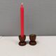 Two beautiful teak candle holders with brass inserts.