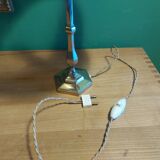 Silver metal lamp with its lampshade