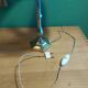 Silver metal lamp with its lampshade