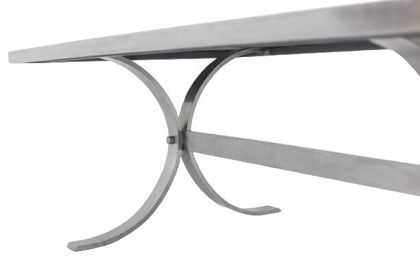 Polished metal and ceramic dining table. 1970s.