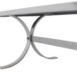 Polished metal and ceramic dining table. 1970s.