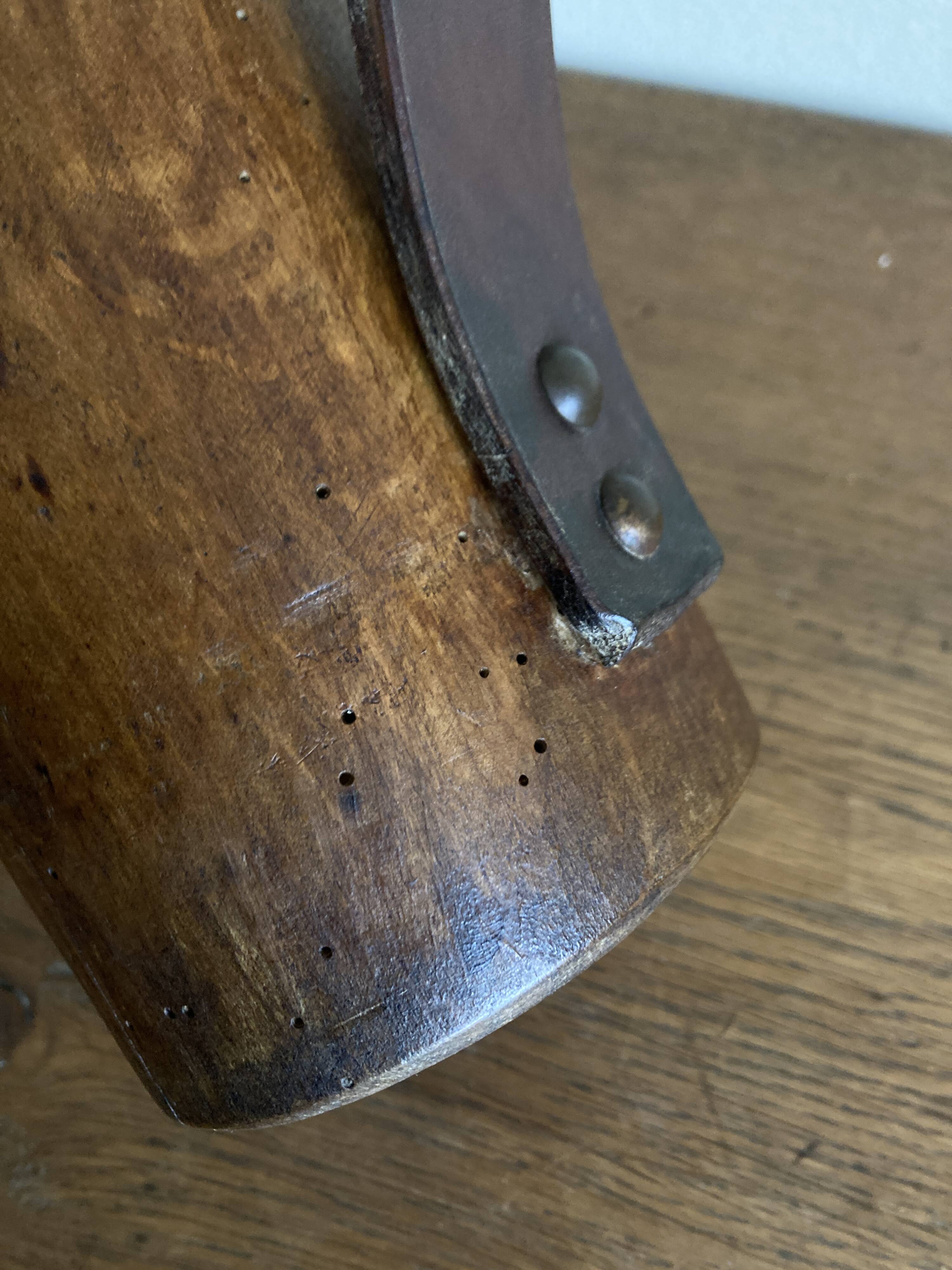 Mountain pitcher in monoxile wood and leather folk art