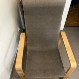 Armchair in curved wood and gray fabric