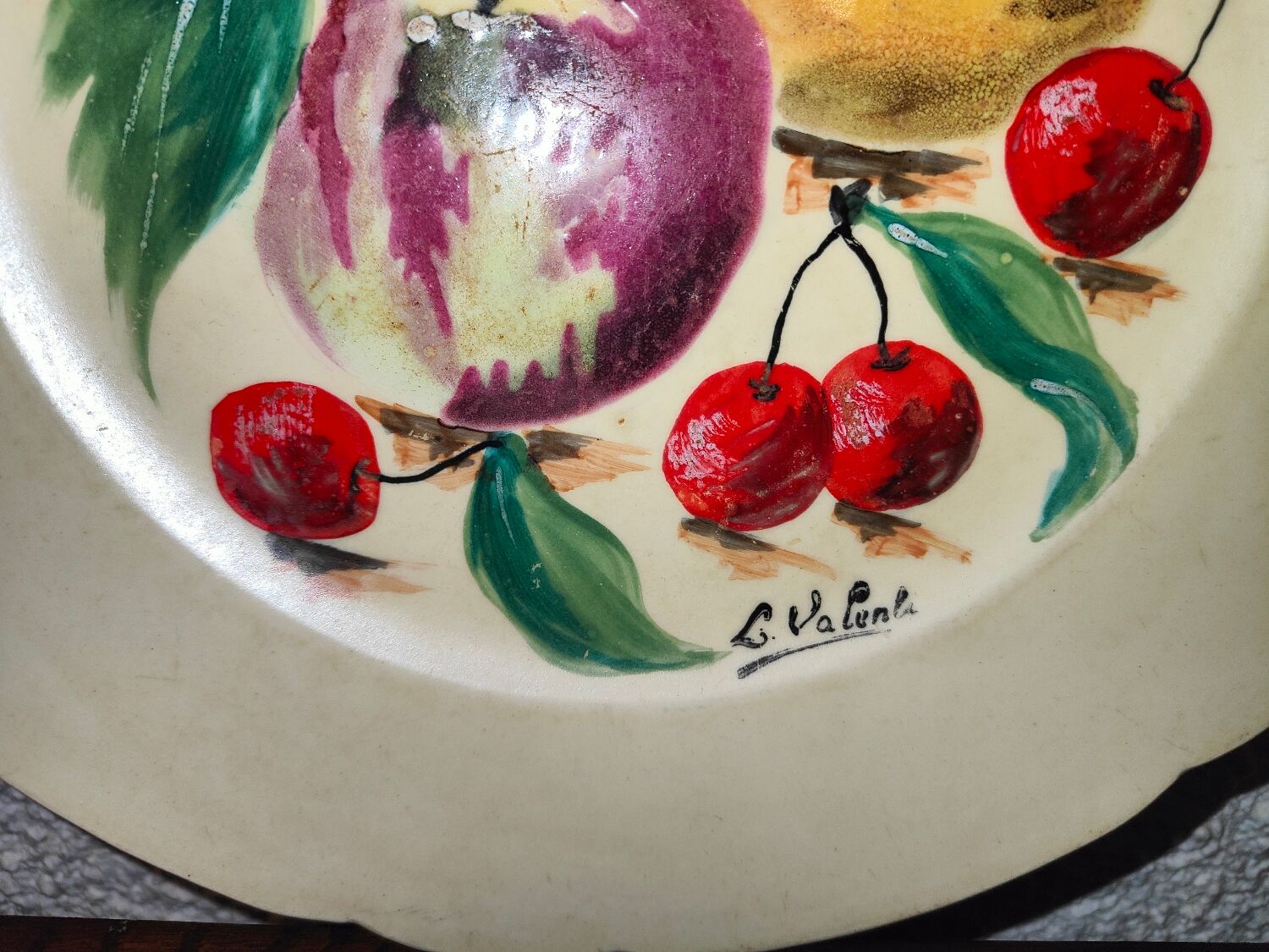 Faience plate in Longwy enamels signed Léa Valentin Les Fruits
