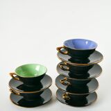 Set of 6 black and colored earthenware cups and saucers, 1950