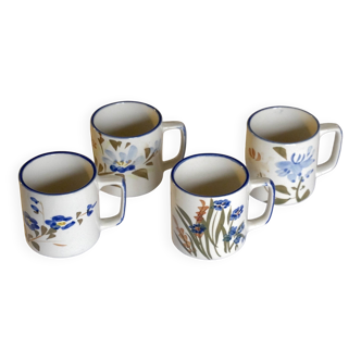 Set of 4 stoneware cups/mugs with blue floral designs, made in China.