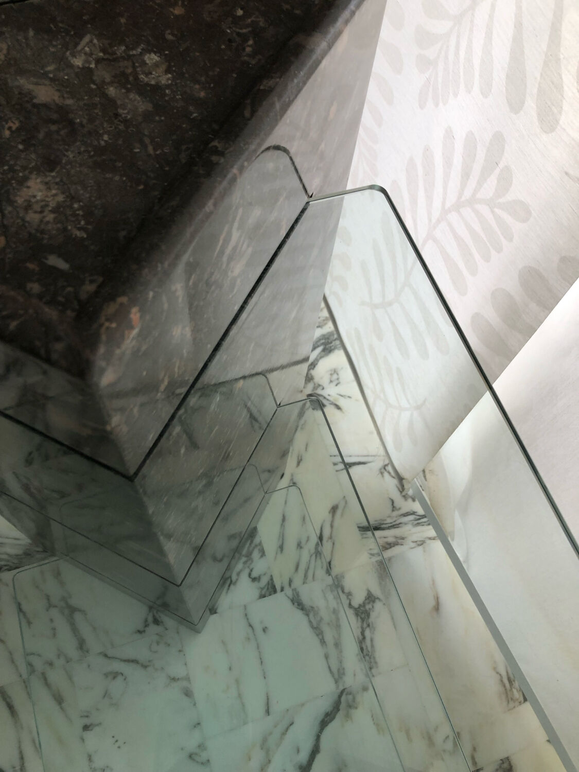 Roche Bobois console in veined black marble and glass, 1990s.