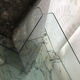 Roche Bobois console in veined black marble and glass, 1990s.