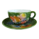 Antique cup and saucer in slipware.