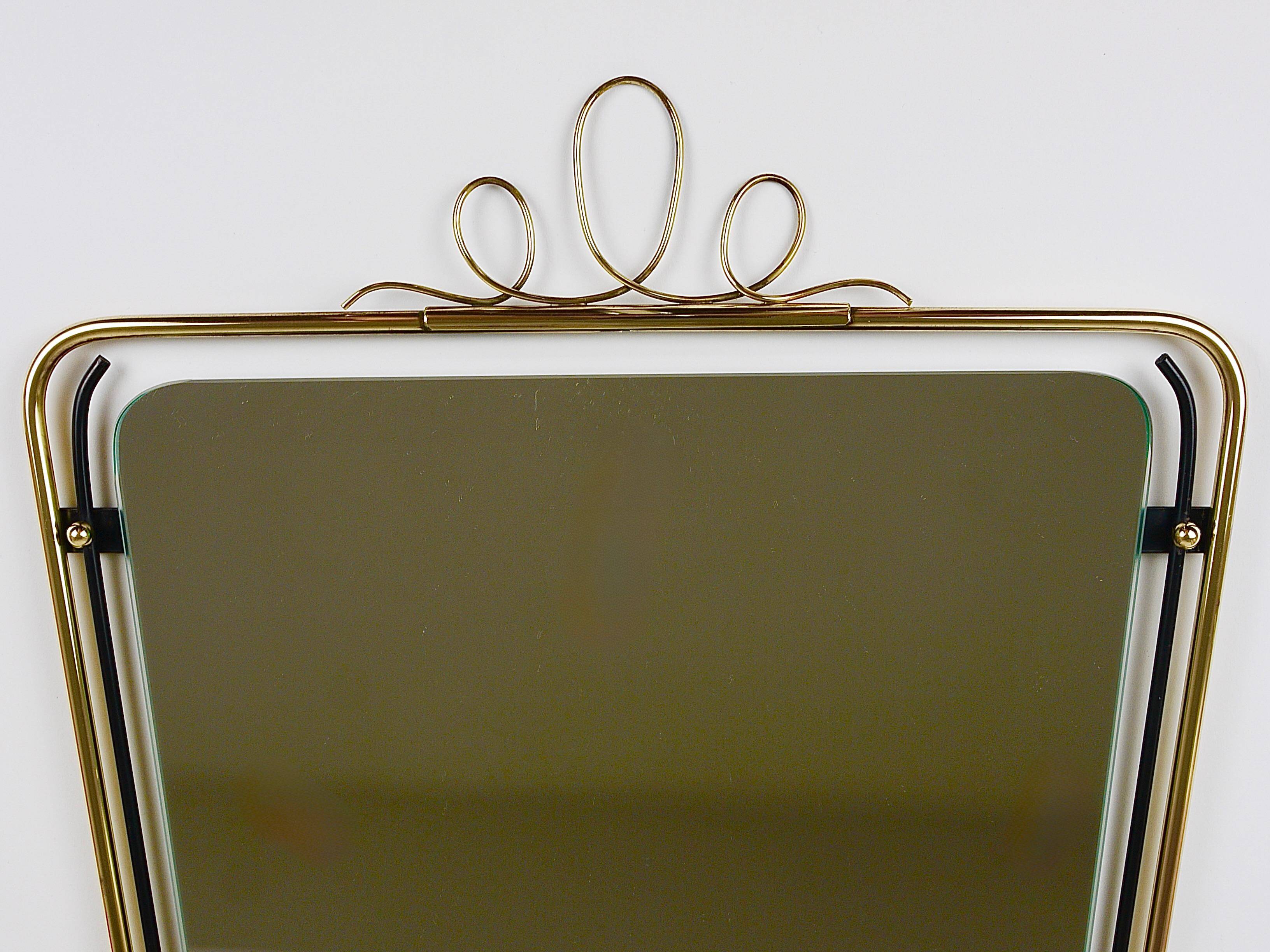 Wall mirror in brass wire with modernist loops from the mid-century, Italy, 1950s.