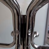 Chrome metal parrot coat holder from the 70s