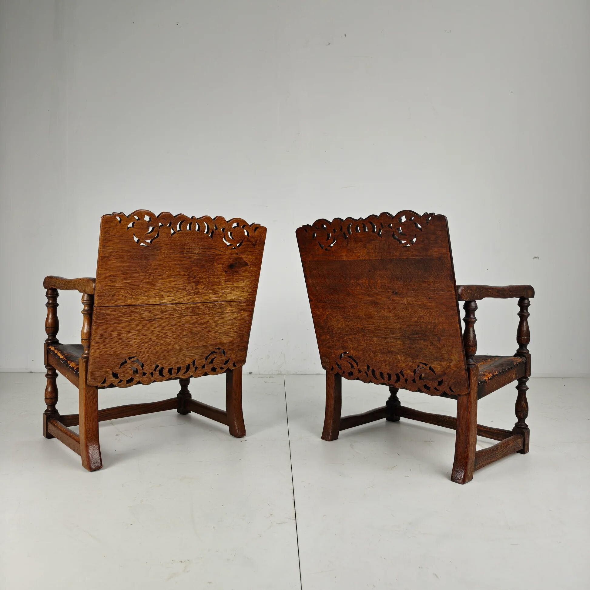 Pair of English antique Jacobean monk armchairs / tables by F. Parker & Sons Ltd