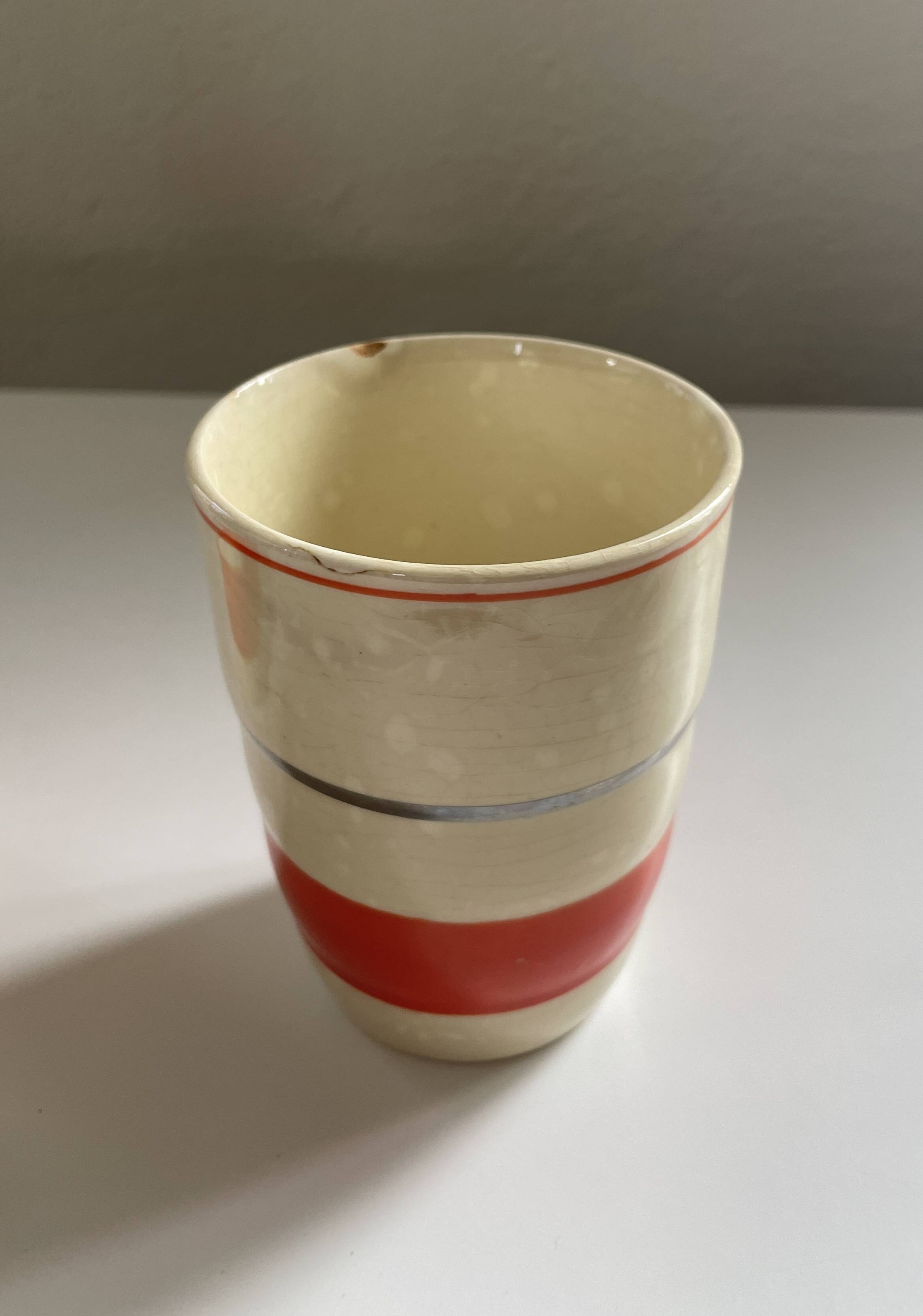 Red, white and silver porcelain jug set by Edmond Bellefroid for Robo.