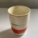 Red, white and silver porcelain jug set by Edmond Bellefroid for Robo.