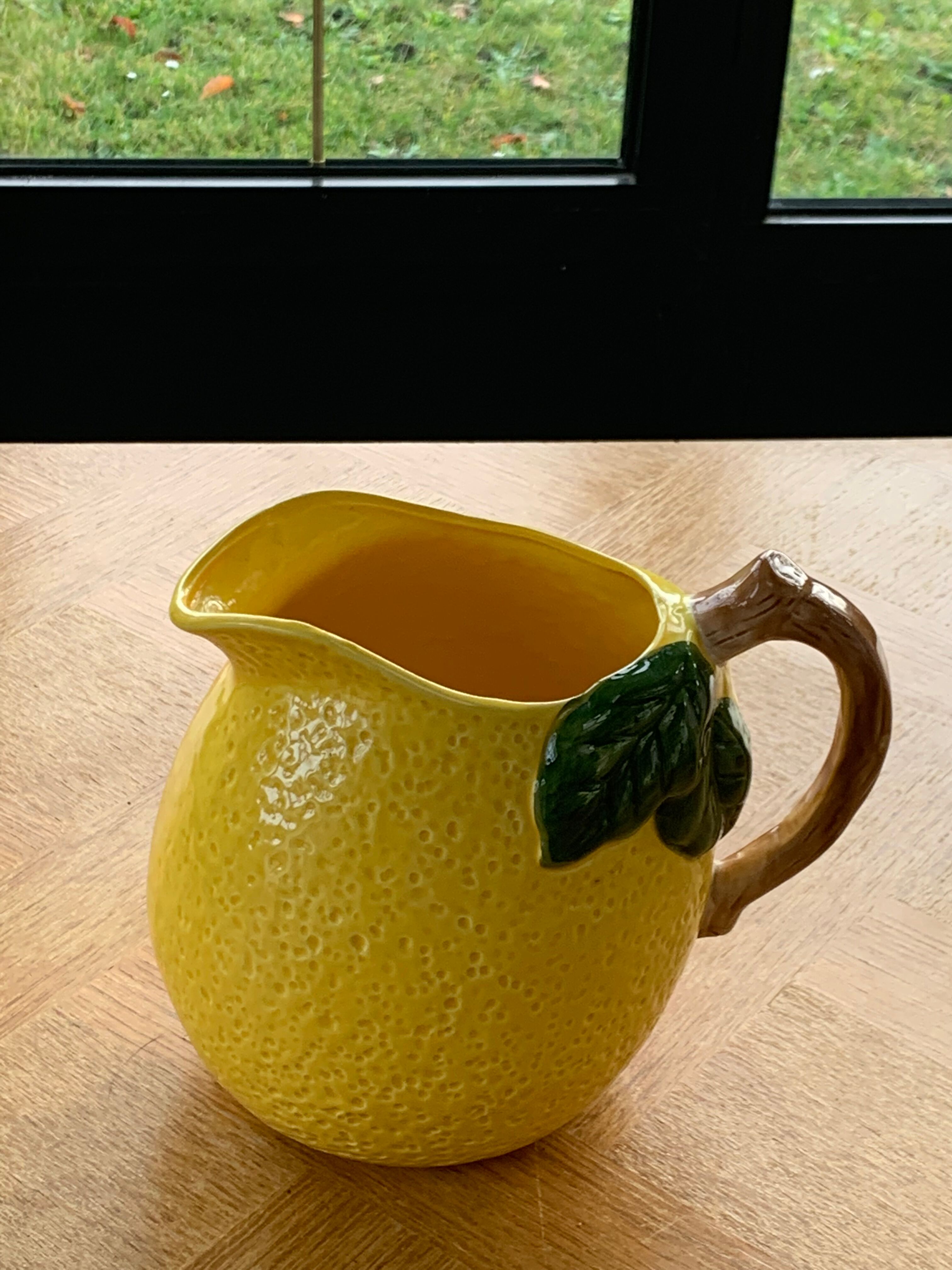 Lemon pitcher in ceramic slurry glazed yellow and green vintage