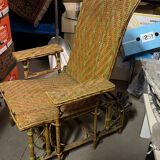 Old long chair rattan wicker garden armchair