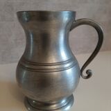 Tin pitcher with handle and spout