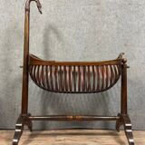 Empire Mahogany Swan Neck Cradle in the Shape of a Basket Circa 1810