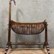 Empire style mahogany cradle with a swan neck, shaped like a cradle, circa 1810