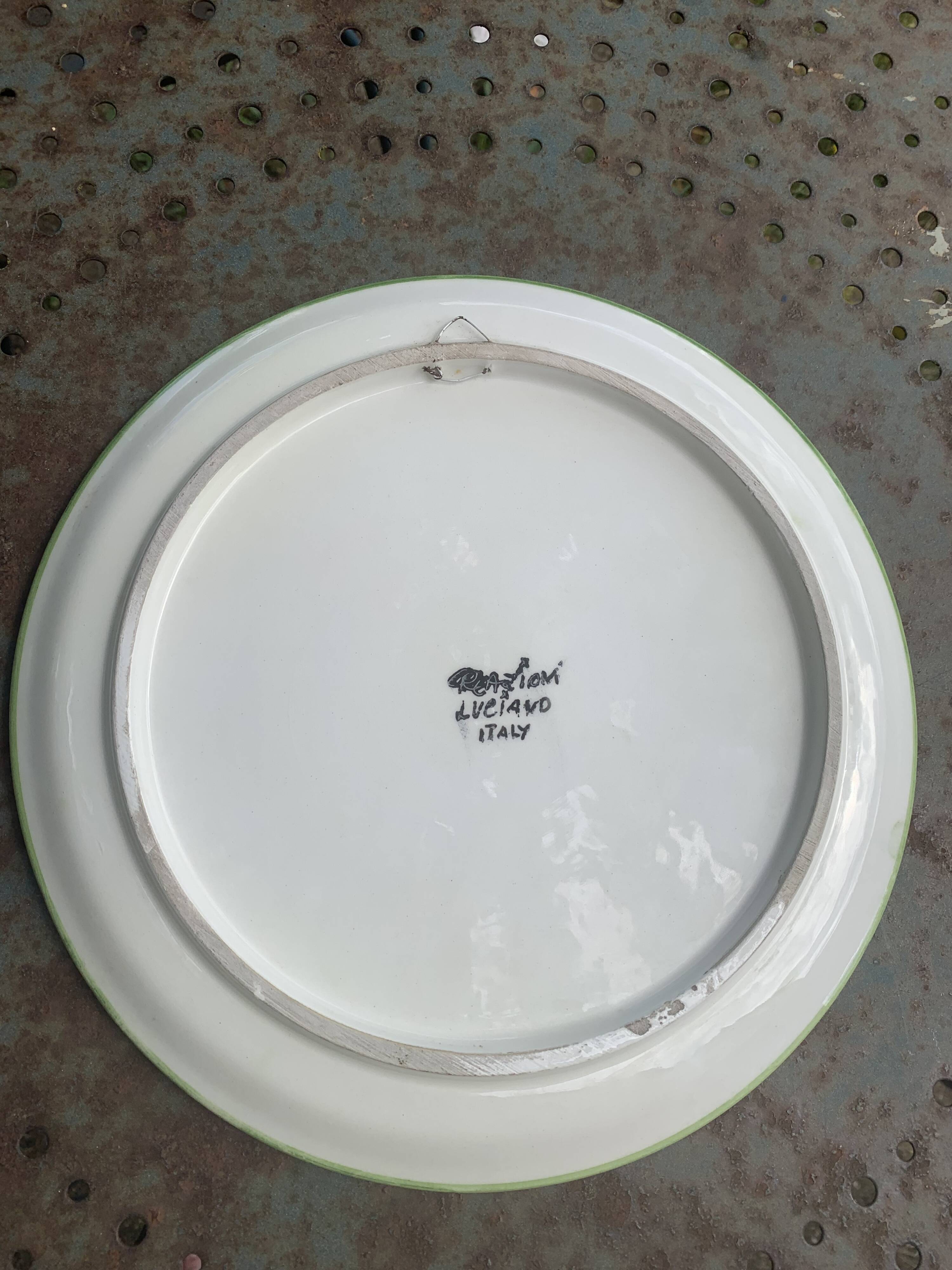 Decorative plate to hang, fruit model, in enamelled ceramic, Les Fruits, signed Luciano