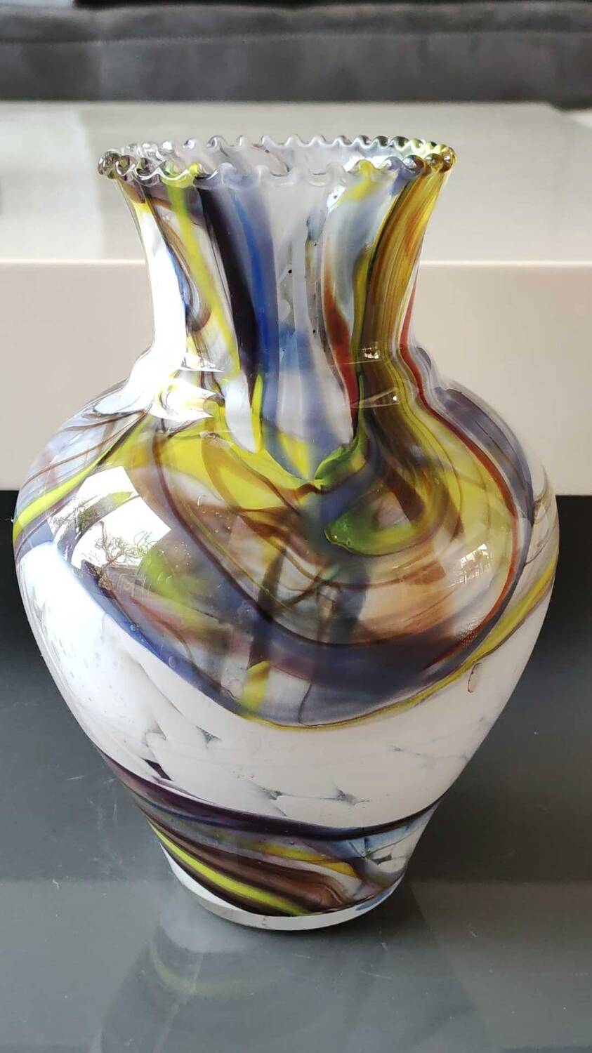 Blown Art glass ball vase from Murano/Italy. Decor swirls of smoke/polychrome waves. Dimensions 20 x 15 cm
