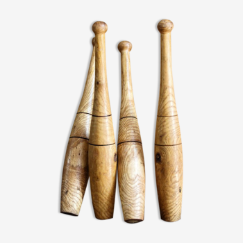 Set of 4 old juggling clubs