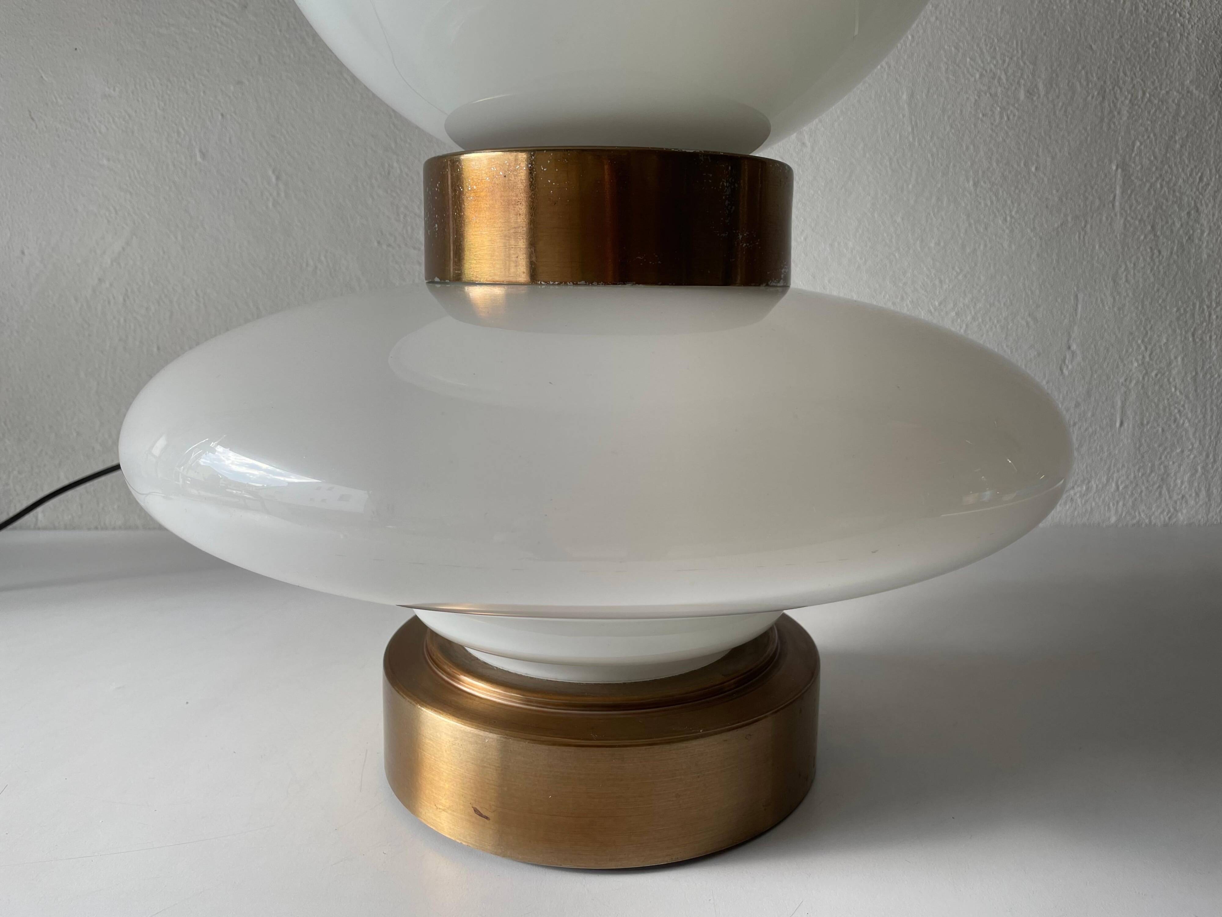 Large table lamp or floor lamp in opal glass and brass body, 1960s, Italy.
