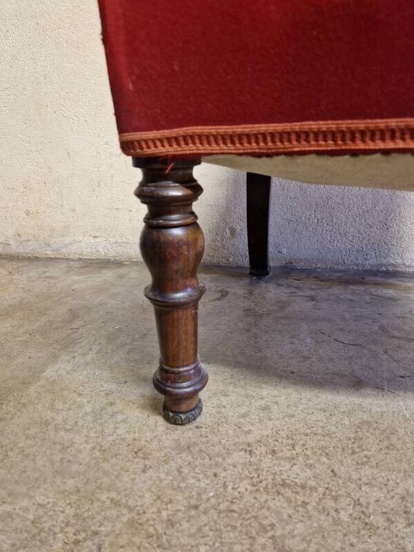 Chair known as a "chauffeuse" from the Napoléon III period, made of carved moulded wood.