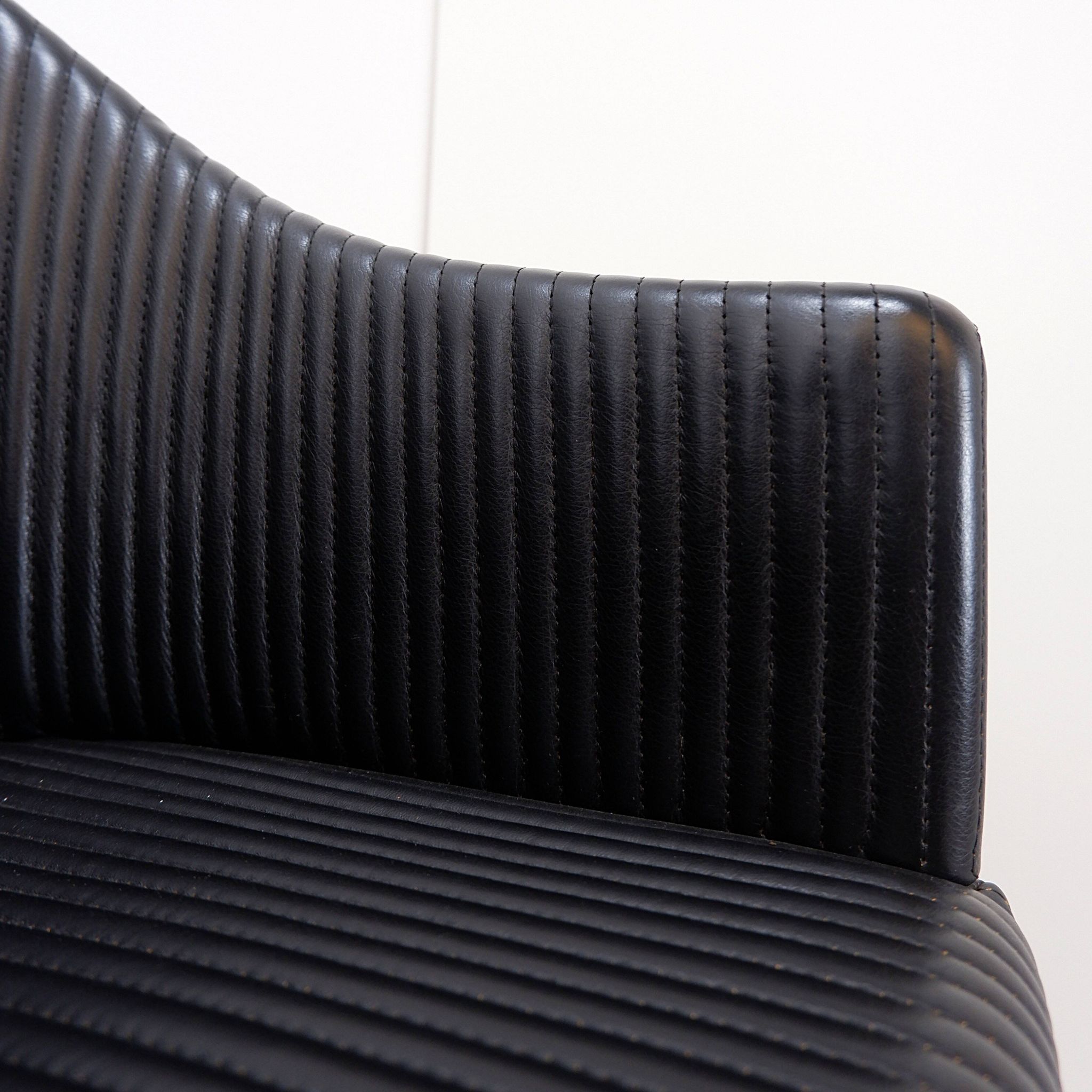 Pair of Artona armchairs in black leather by Afra and Tobia Scarpa for Maxalto.