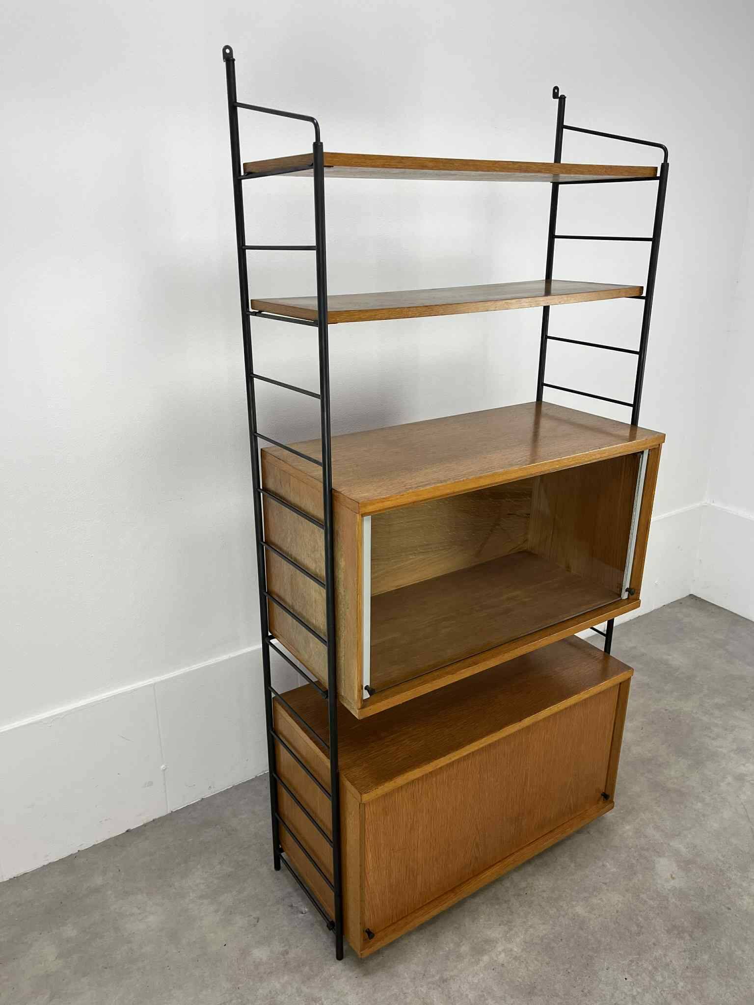 Modular shelf from the 1950s, wood and metal, vintage.