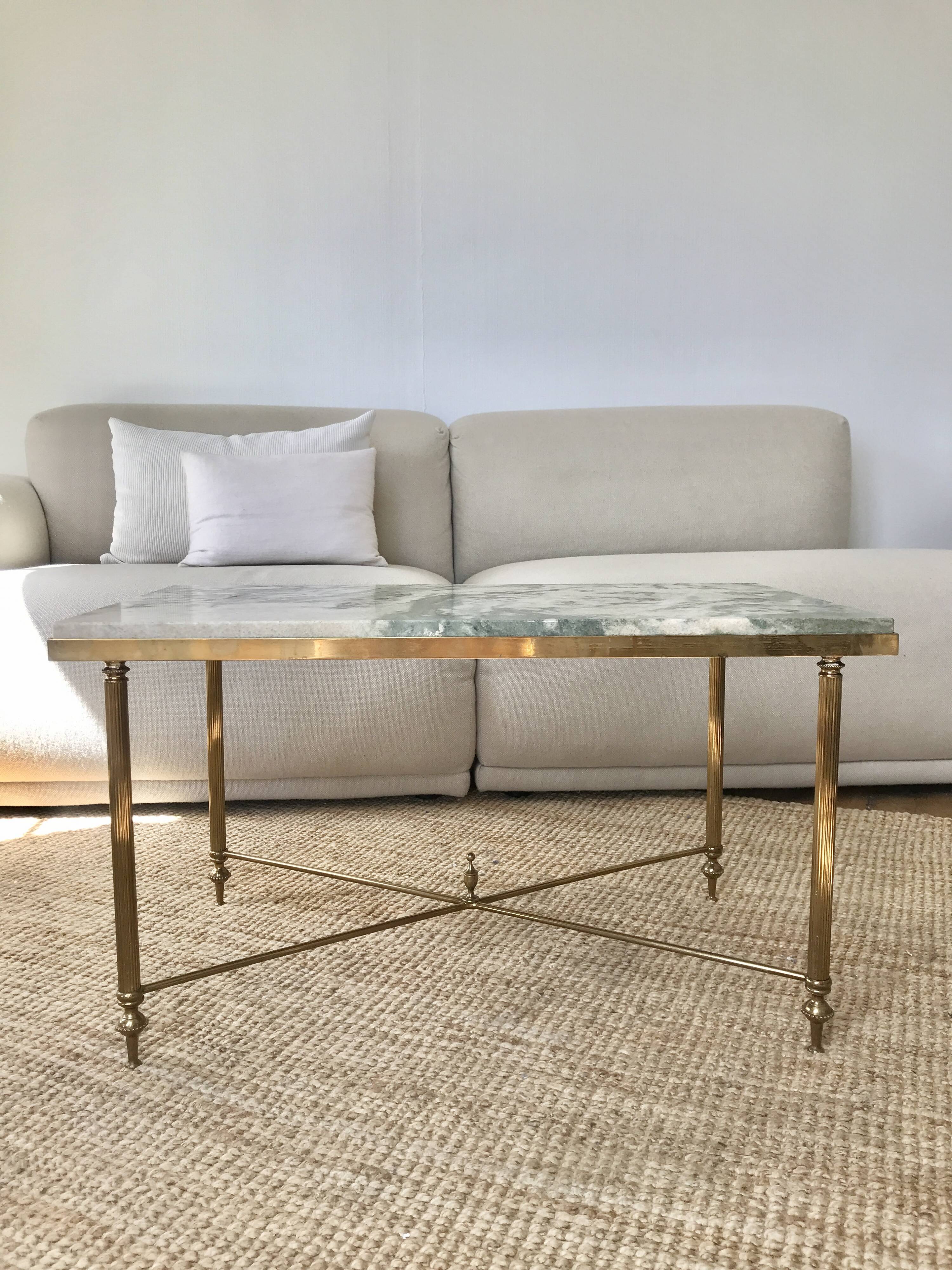 Coffee table in brass and green marble